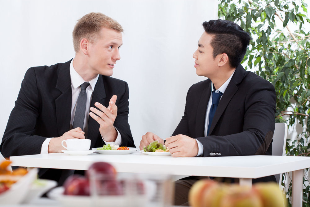 https://www.wellics.com/hubfs/Diverse%20workers%20eating%20lunch%20in%20the%20office.jpeg